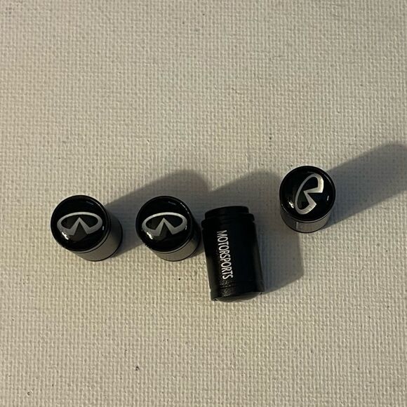 Infinity Motorsports valve Stem caps in black set of 4 NWT - Picture 1 of 4